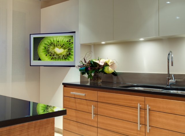 Sony LCD TV on pull & rotate wall bracket in the kitchen